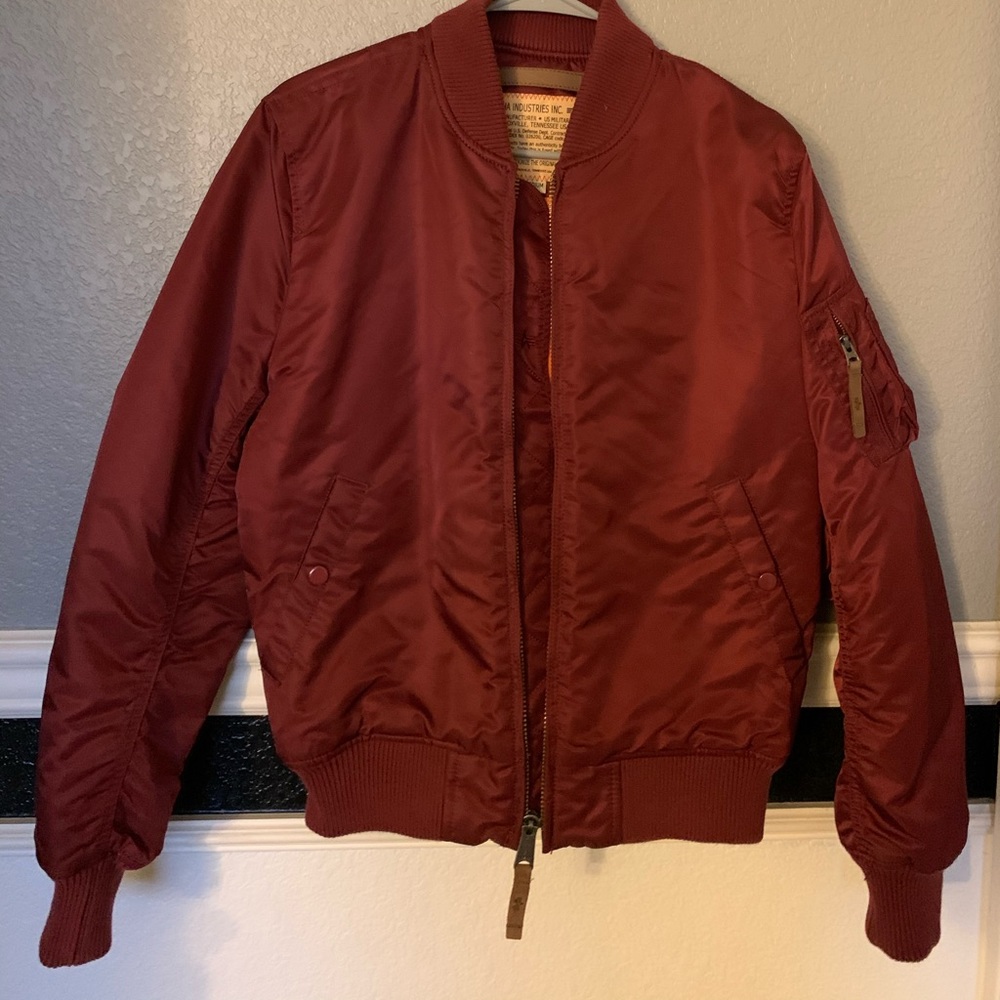 Shiny red bomber jacket